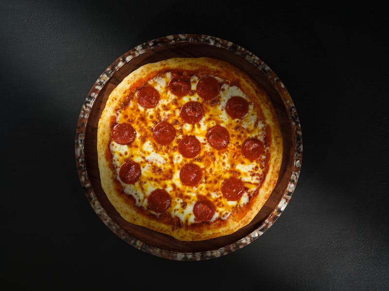 Wood-fired vegetable pizza with seasonal toppings